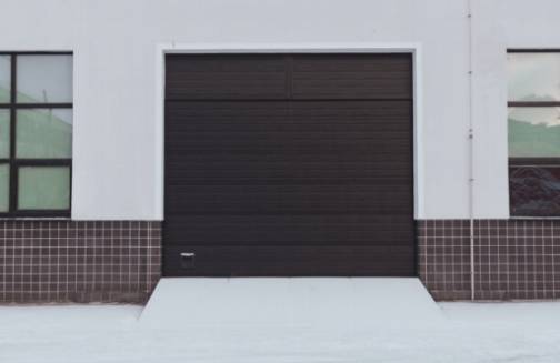 Elevate Your Home's Aesthetic: How Garage Door Painting Can Make a Big Impact