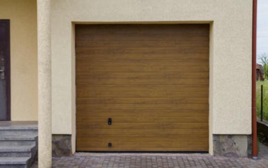 The Top Signs That It's Time for Garage Door Panel Replacement