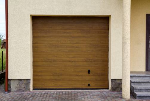 Why Garage Door Track Adjustment is Essential for Home Safety and Security